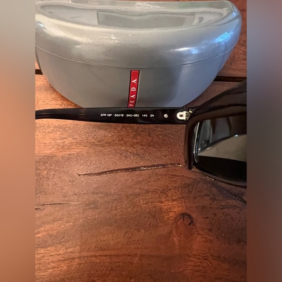 Prada Classic sunglasses with a contemporary rectangular design, mint condition. - Picture 6 of 9